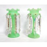 Pair of 19th century green lustres with drops, 27cm high.
