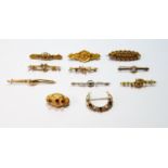 Garnet and pearl crescent brooch in 9ct gold, 1976, and another ten, mostly gold.   (11)
