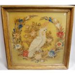 19th century needlepoint depicting a cockatoo and floral garland, 64cm x 64cm.