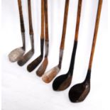 Seven hickory-shafted gold clubs to include two J.C. White, Troon, Special; W.M. Winton & Co Ltd.,