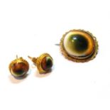 Victorian operculum brooch and a pair of similar ear studs, in gold.   (3)