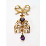 Gold brooch/pendant with amethyst and pearl drop dependant from a pearl-set bow, probably 15ct.