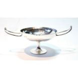 Silver hammered tazza of Art Nouveau style with slender pointed knopped handles on spreading foot,