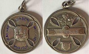 London, Midland & Scottish Railway silver PASS MEDALLION numbered 486, issued to S H Gould. Circular