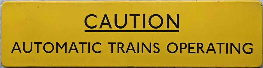 1960s London Underground ENAMEL SIGN 'Caution, Automatic Trains Operating', from the Hainault-