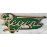 Cast-alloy & chrome BUS RADIATOR BADGE 'Regent'. Background colour suggests it may be ex-Ipswich