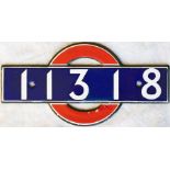 London Underground enamel STOCK-NUMBER PLATE from 1938-Tube Stock Driving Motor Car 11318. These