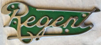 Cast-alloy & chrome BUS RADIATOR BADGE 'Regent'. Background colour suggests it may be ex-Ipswich