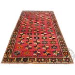 A Caucasian hand woven wool carpet,