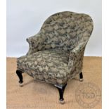 An Edwardian salon chair, with floral blue upholstery, on tapered legs, 83cm H,