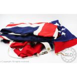 A large United States of America cotton flag, 135cm H x 240cm W with a New Zealand cotton flag,