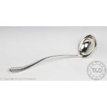 A silver Old English pattern ladle, James Deakin & Sons, Sheffield 1925, 33cm long, weight 8.