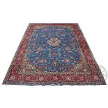 A Persian hand woven wool Sarouk carpet,