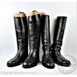 A pair of black leather riding boots, with embossed mark for W. S.