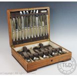 A silver plated canteen of cutlery, in oak case,