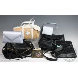 A collection of assorted handbags, to include; a Bally tan and white handbag with a dust bag,
