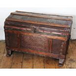 An 18th century Baroque style embossed leather studded chest,