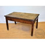 A rustic oak country kitchen table, made from 18th and 19th century timbers, with two plank top,