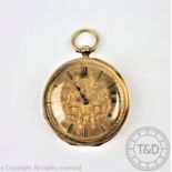 A yellow gold open face fob watch, the decorative gilt dial depicting birds on terraces,