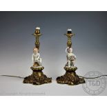 A pair of 20th century figural candlesticks,