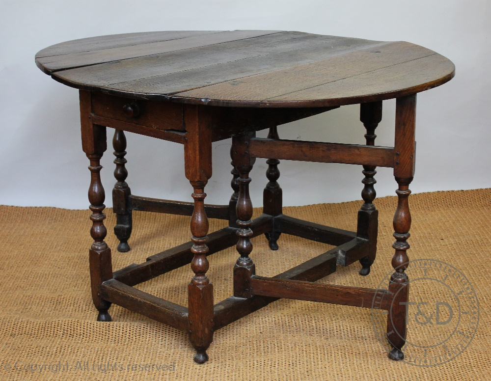 An 18th century oak gate leg table, with drawer, on turned and block legs, - Image 3 of 4