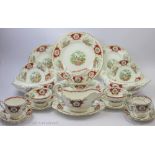A Coalport Broadway Marone pattern dinner and tea service, comprising; two tureens,