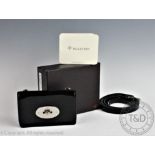 A Mulberry Bayswater Mini Messager shoulder bag for phone and cards in patent black,