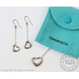 An Elsa Peretti for Tiffany & Co diamond set, sterling silver open heart pendant,
