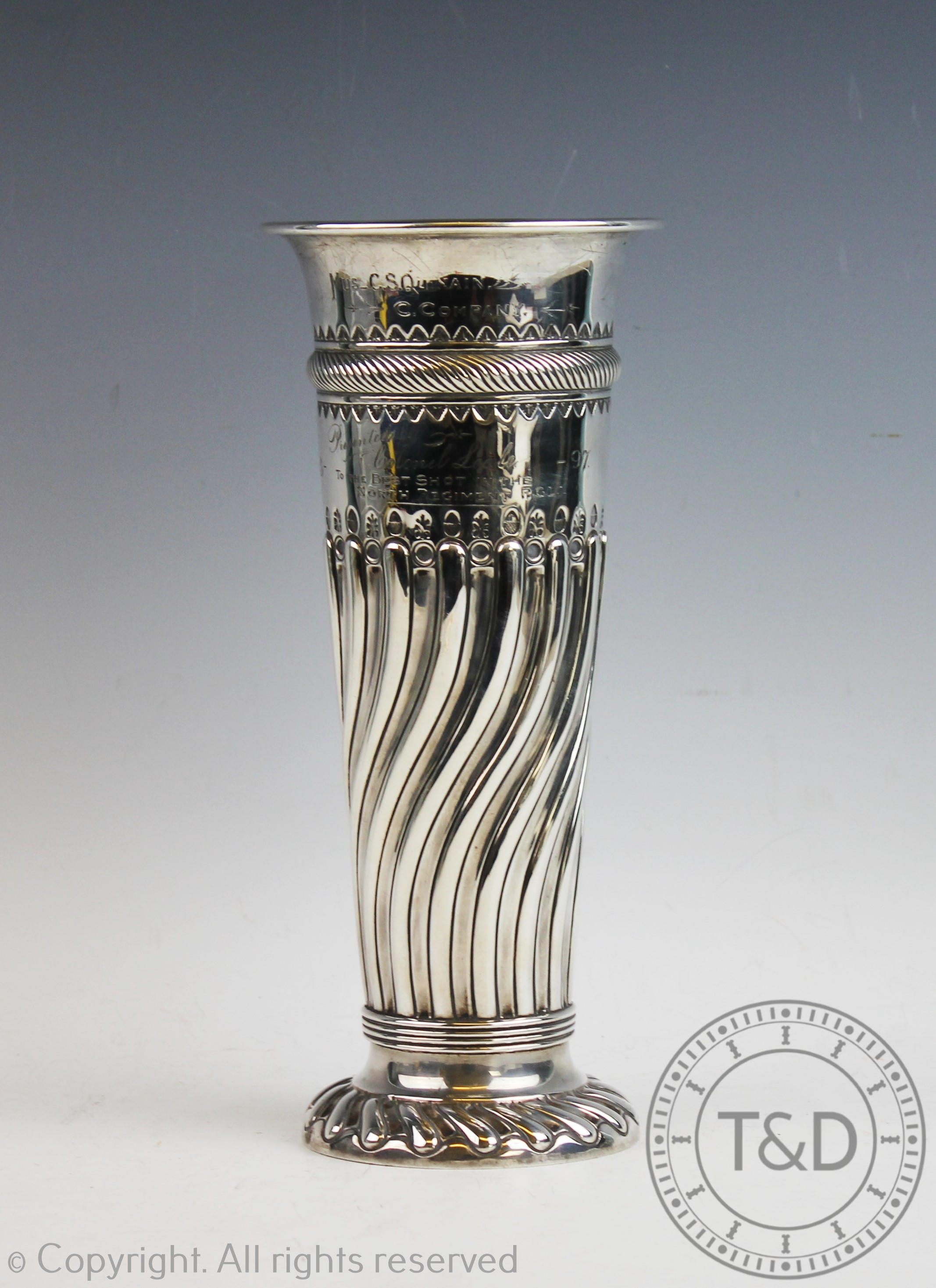 A silver vase Sibray, Hall & Co Ltd, London 1894 of half wrythen form,