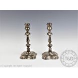 A pair of George III style silver candlesticks, Fordham & Faulkner, Sheffield 1904,