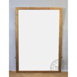 A rectangular wall mirror, with bevelled plate and gilt frame,