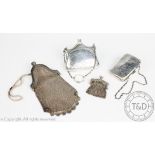 Two Edwardian silver chatelaine purses, Birmingham 1906 and Chester 1902,