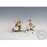 A Sitzendorf porcelain figural group, late 19th century/ early 20th century,