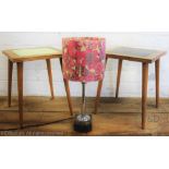 A pair of late 1950's early 1960's beech side tables, with inset painted glass tops,