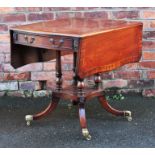 A reproduction Regency style serpentine mahogany Pembroke table, with one drawer,