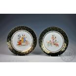 A pair of 20th century Austrian porcelain wall plates,