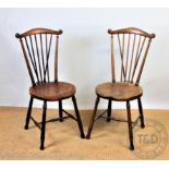 A set of four early 20th century stained beech kitchen chairs,