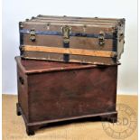 A wood, metal and canvas mounted travelling trunk, 33cm H x 87cm W x 51cm D,