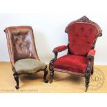 An early Victorian carved mahogany salon chair, with elaborate frame and floral red upholstery,
