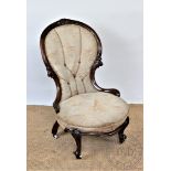 A Victorian carved walnut salon chair, with upholstered back and oval seat, on cabriole legs,