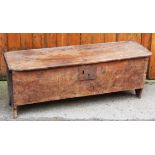 An 18th century continental six plank coffer, possibly fruit wood or cedar,