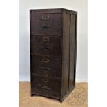 An early 20th century stained pine filing cabinet, with four drawers, 132cm H x 52cm W x 65cm D,