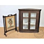 A 19th century oak hanging corner cabinet, with glazed doors, 108cm H x 101cm W,