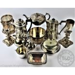 A selection of mixed plated wares, to include; bottle sleeves and coasters, a pair of candlesticks,