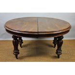 A Victorian mahogany extending dining table,