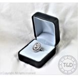 A diamond set dress ring,