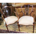 A pair of Edwardian inlaid mahogany Sheraton style carver chairs,