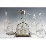 A selection of silver plate and glass to include a late Victorian cruet stand of elaborate form