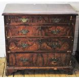 An 18th century style walnut chest, of small proportions, with four graduated long drawers,