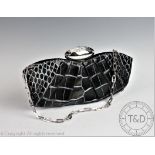 A Daniel Swarovski limited edition clutch bag or purse,